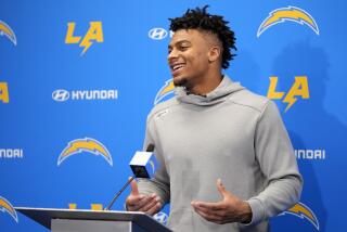 Los Angeles Chargers wide receiver Brenden Rice speaks during a news conference.