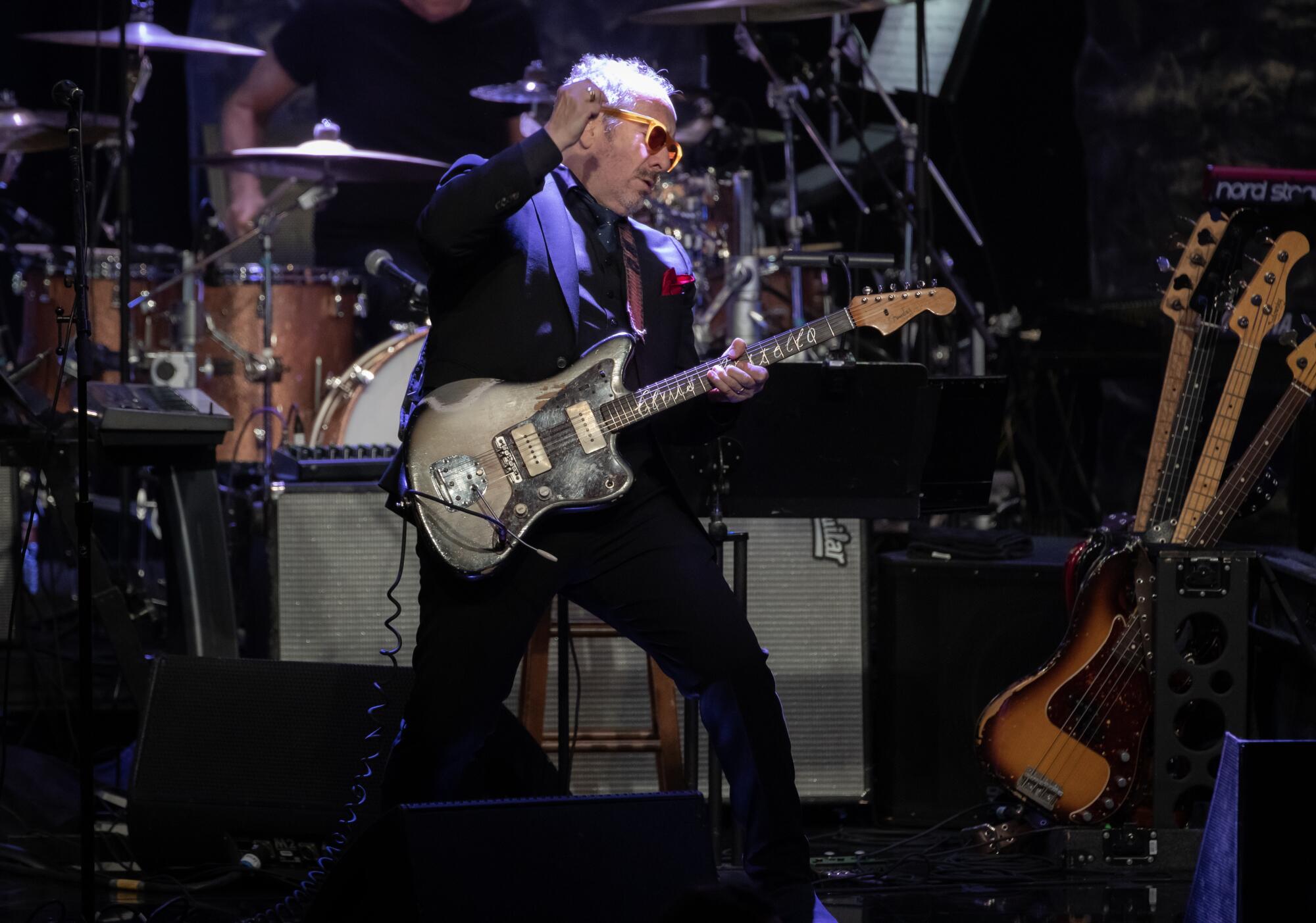 Elvis Costello performs at the 2023 pre-Grammy gala.