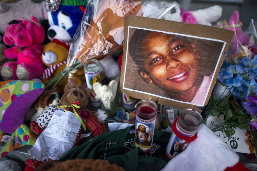 FILE -- A makeshift memorial for Tamir Rice, the 12-year-old who was fatally shot by a police officer outside a recreational center, at the park where he was killed in Cleveland, Ohio, Dec. 4, 2014. More than two years after Rice was fatally shot by a police officer, the cityOs police chief has disciplined the 911 operator who took the call for violating protocol in her handling of the situation. (Ty Wright/The New York Times)