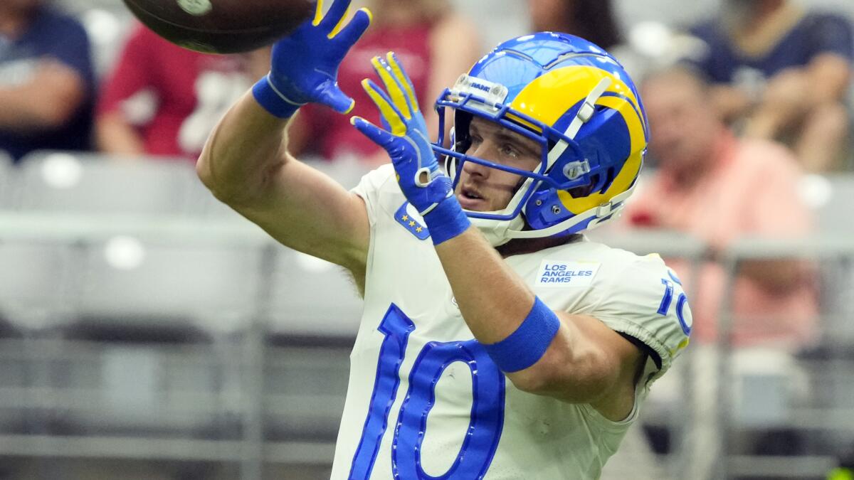 Los Angeles Rams quarterback Matthew Stafford connects with wide receiver  Tutu Atwell downfield for a 31-yard touchdown