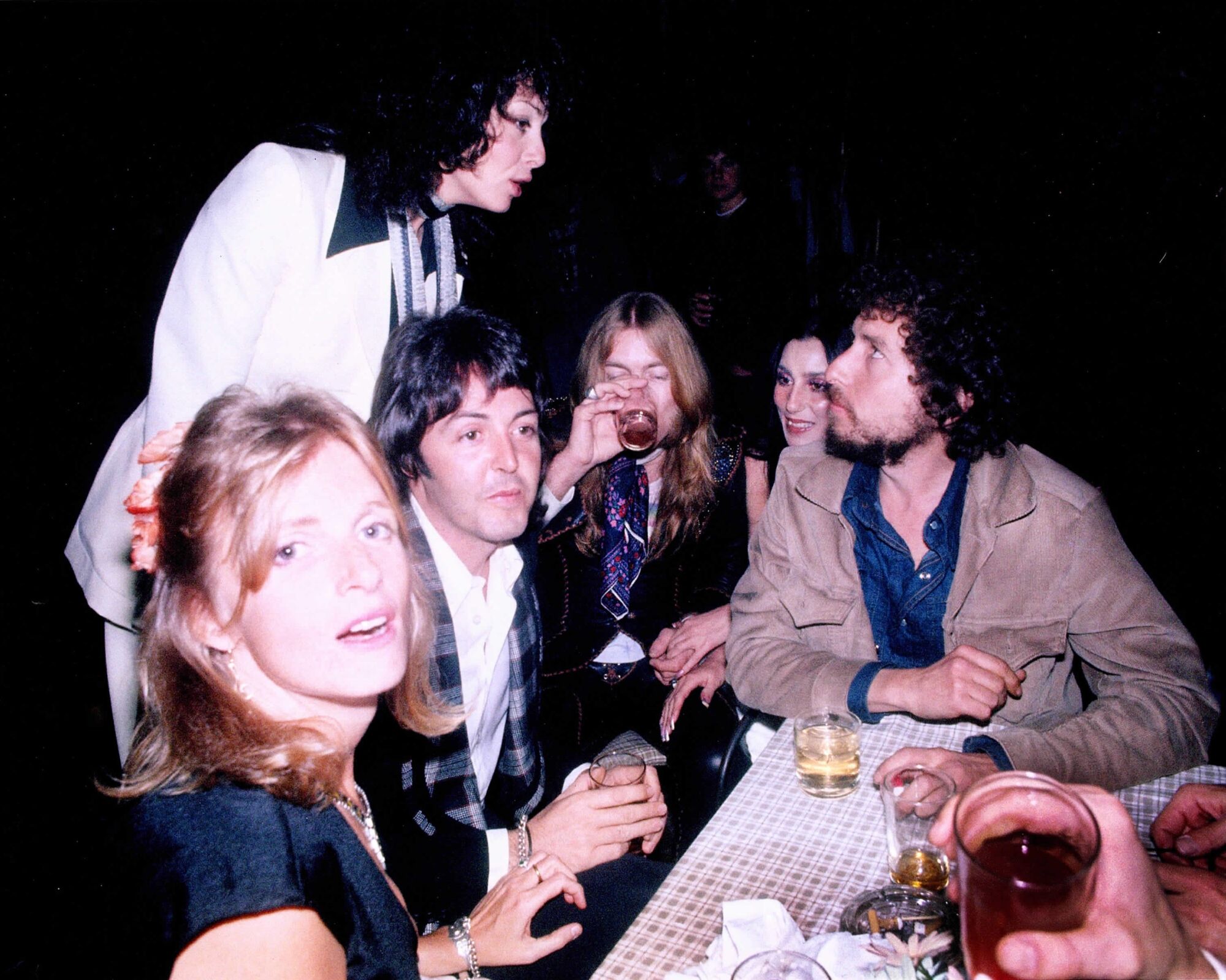 Linda and Paul McCartney, Gregg Allman, Cher, Bob Dylan and Sara Dylan at a party thrown by Rod Stewart.