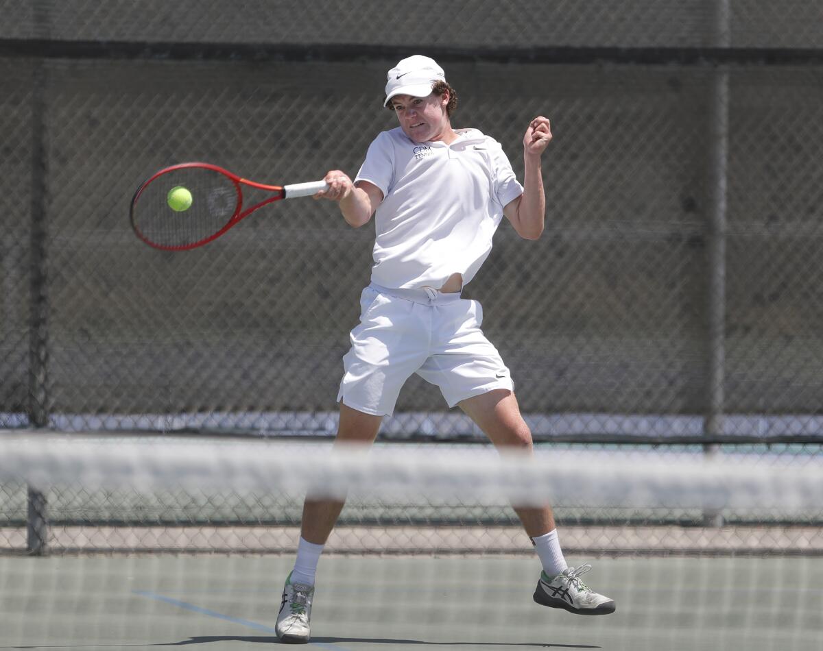 Jack Cross of Corona del Mar hits a forehand against Calabasas on Thursday.