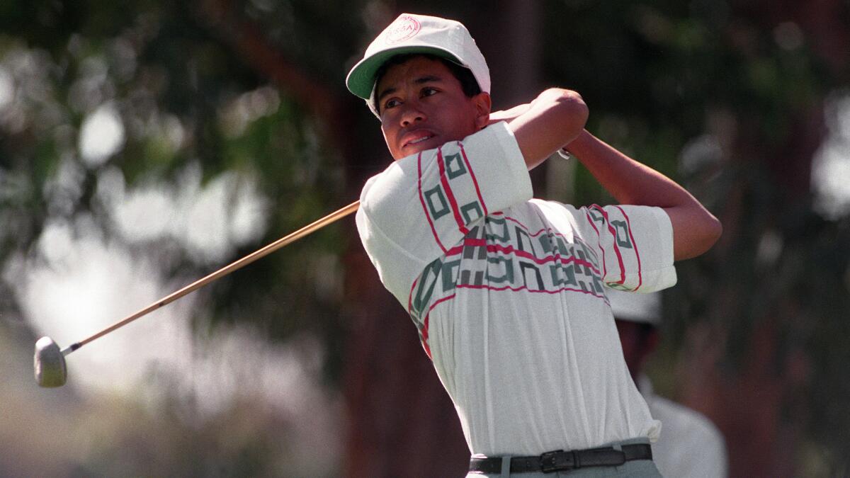 A 17-year-old Tiger Woods hits his tee shot on the 11th hole during the Pro-Am portion Los Angeles Open at Riviera Country Club in Los Angeles. Woods made his PGA Tour debut at Riviera.