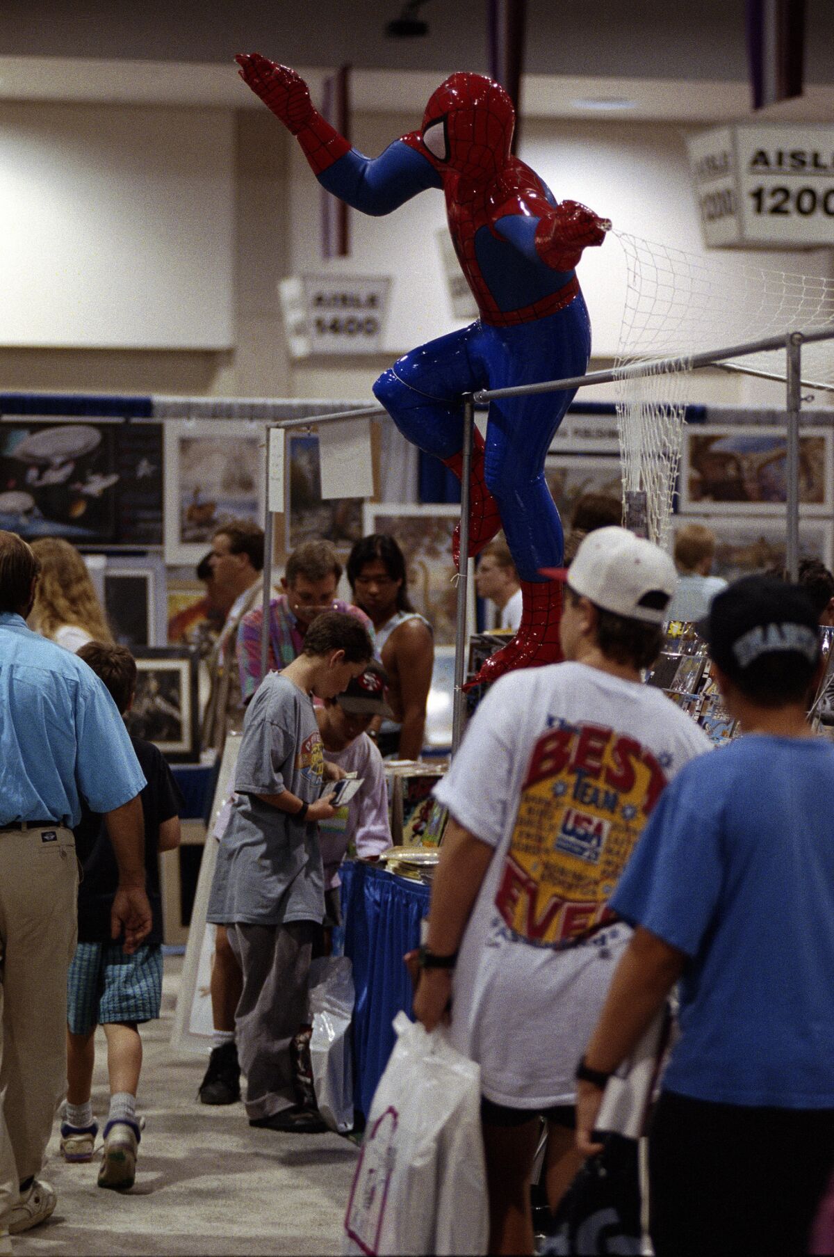 An inflatable Spiderman hovers above the crowd in 1992 at the San Diego Convention Center.