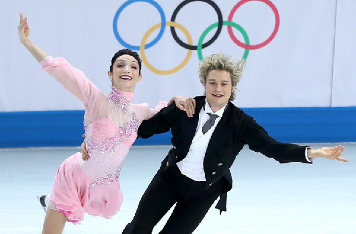 American Meryl Davis and Charlie White perform their short dance routine as part of the team figure skating competition on Saturday at Iceberg Skating Palace.