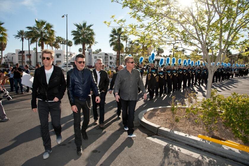Rascal Flatts leads the Foothill High School Marching Band into The Joint at Hard Rock Hotel on Thursday.