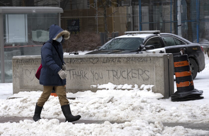 A person walks through snow in Canada