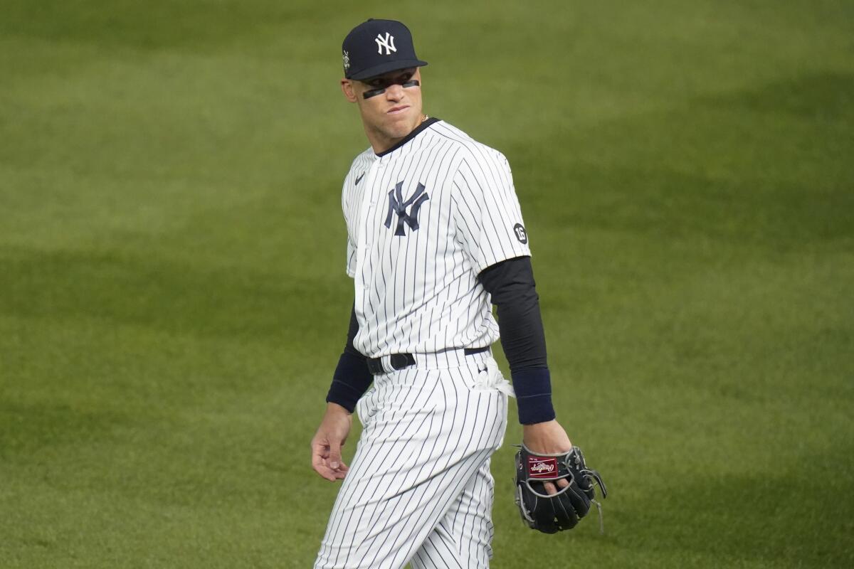 New York Yankees' Aaron Judge looks into the stands during the fourth inning of the team's baseball game against the Tampa Bay Rays on Friday, April 16, 2021, in New York. (AP Photo/Frank Franklin II)