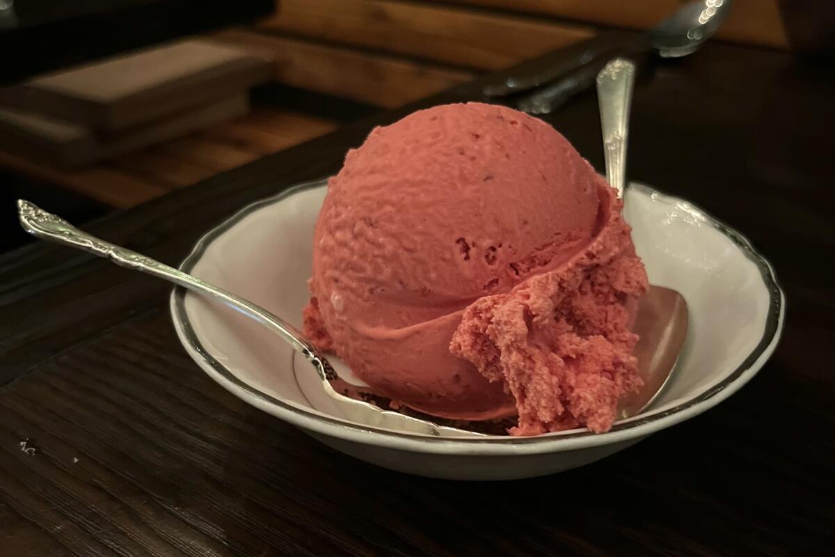 A scoop of Ronan's house-made boysenberry ice cream.
