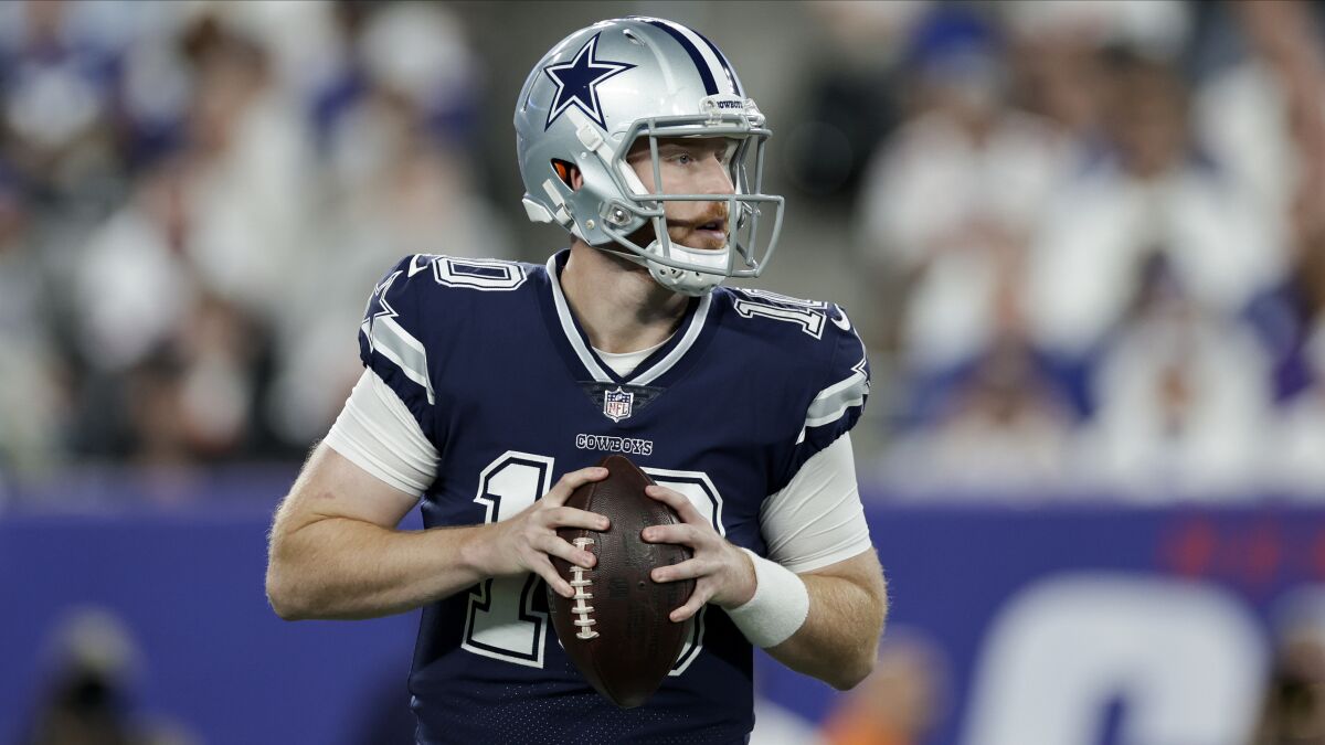 Dallas Cowboys quarterback Cooper Rush (10) passes against the New York Giants.
