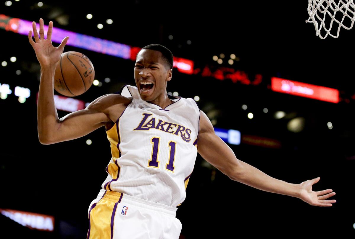 Lakers forward Wesley Johnson reacts after scoring against the Celtics in the second half Sunday night at Staples Center.