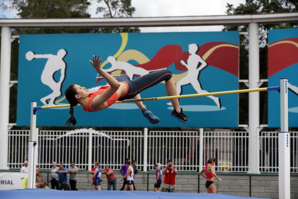 Russia's Maria Kuchina clears the bar competing in the Russian Athletics Cup on Thursday outside Moscow. Russia lost its appeal Thursday against the Olympic ban on its track and field athletes.
