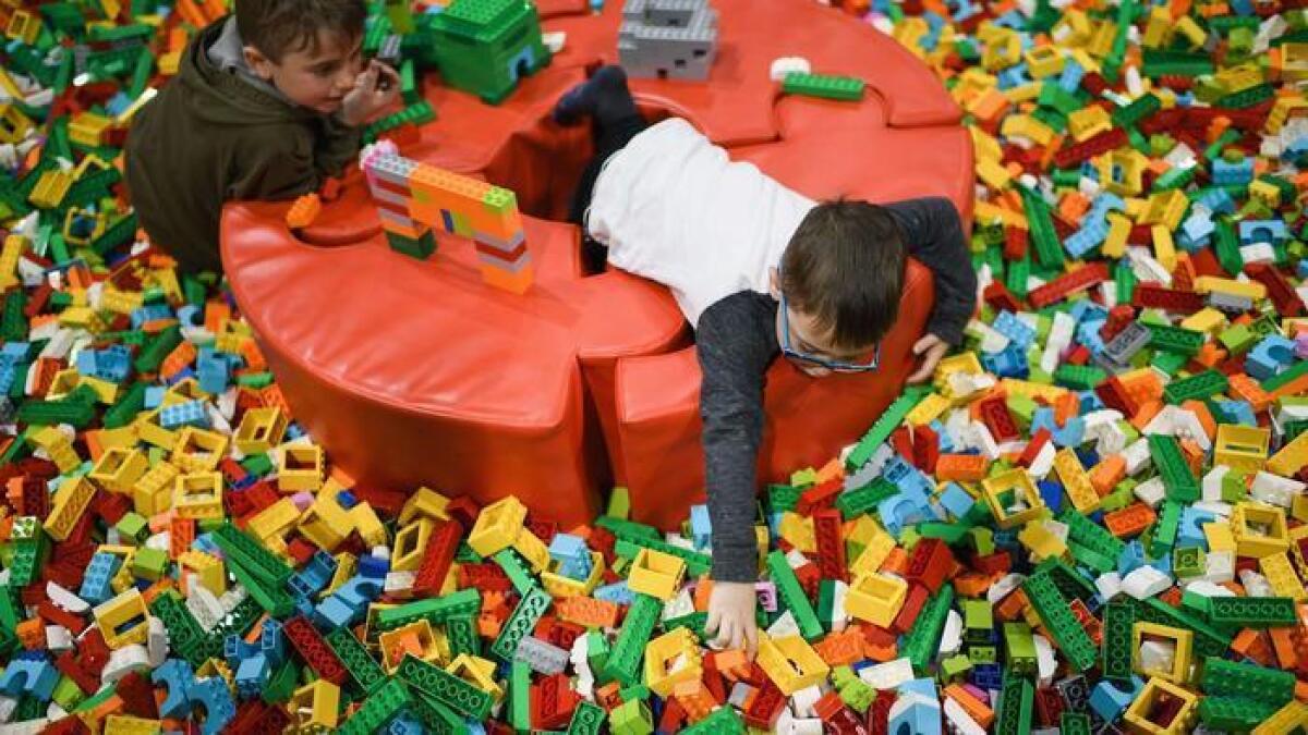 Los niños juegan con bloques de Lego en un evento en Escocia, en julio pasado (Jeff J. Mitchell / Getty Images).