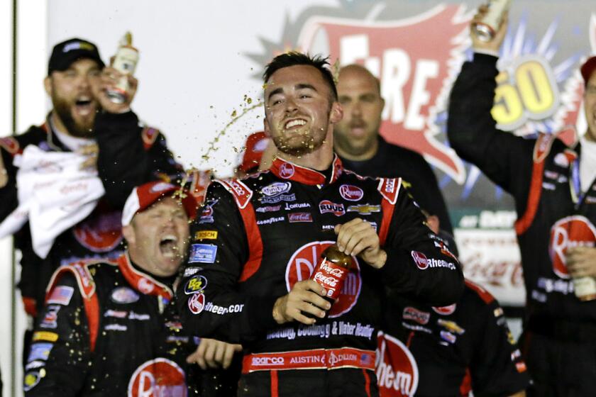 Austin Dillon celebrates in Victory Lane after winning the NASCAR Xfinity Series race at Daytona International Speedway on Saturday night.