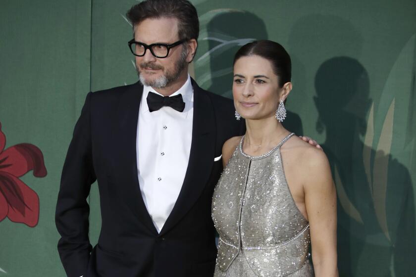 FILE - In this file photo dated Sunday, Sept. 22, 2019, British actor Colin Firth and his wife Livia, pose for photographers upon arrival at the Green Carpet Fashion Awards in Milan, Italy. A statement from their publicists says Colin and Italian eco-campaigner and film producer Livia Firth have separated after 22-years of marriage. (AP Photo/Luca Bruno, FILE)