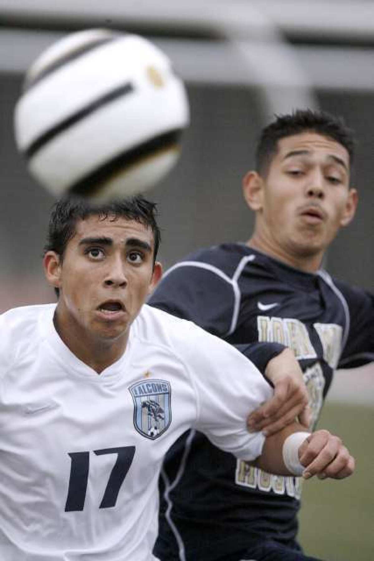 Crescenta Valley High School's #17 Pablo Sotillo keeps his eye on the ball during home game vs. Muir High School in La Crescenta on Friday, January 25, 2013. The game ended in a tie, 1-1.