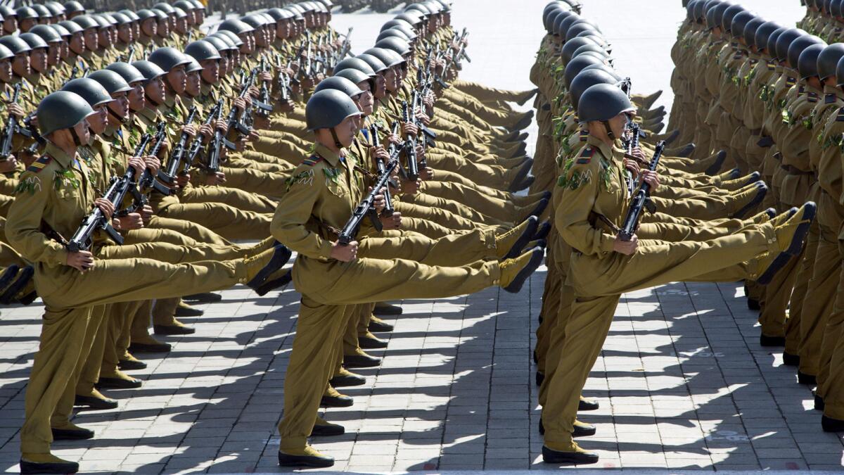 Soldiers march Sunday in the parade marking the 70th anniversary of North Korea's founding.