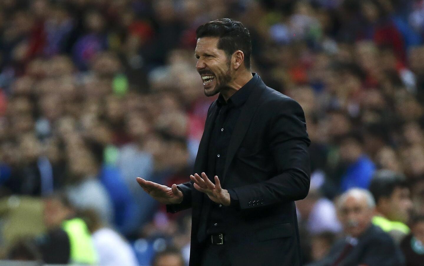 Atletico Madrid's coach Diego "Cholo" Simeone reacts during their Spanish first division derby soccer match in Madrid