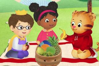 An animated still of a little boy, girl and a tiger sitting around a bowl of fruit on a picnic blanket.