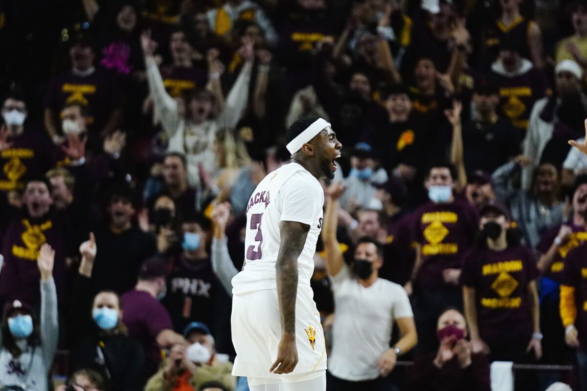 Arizona State's Marreon Jackson shouts as the crowd cheers his three-pointer Feb. 5, 2022, in Tempe.