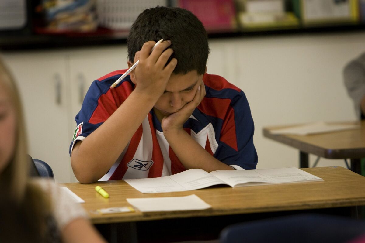 A 6th-grader takes a standardized test at Pershing Middle School in 2010