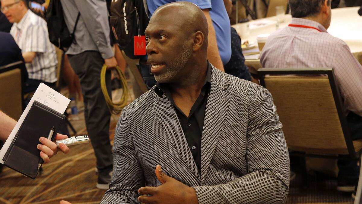 Chargers coach Anthony Lynn speaks to the media during the NFC/AFC coaches breakfast during the annual NFL football owners meetings on Tuesday in Phoenix.