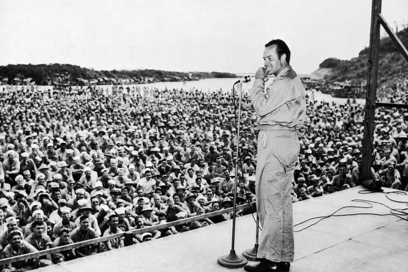 Bob Hope performs for U.S. troops in 1944, part of an influential career that crossed the 20th century.