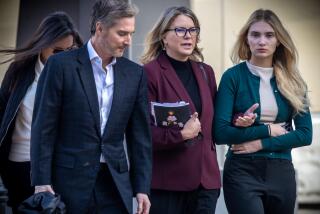 VAN NUYS, CA - FEBRUARY 14: Rebecca Grossman, second from left, with her husband, Dr. Peter Grossman, left, and daughter heads to Van Nuys Courthouse West Van Nuys, CA. (Irfan Khan / Los Angeles Times)