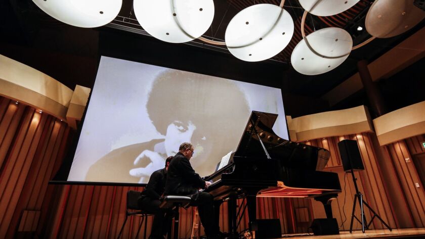 British pianist Nicolas Hodges performs the Angela Davis movement from Peter Ablinger's "Voices and Piano" for his Monday Evening Concert recital in Zipper Concert Hall.