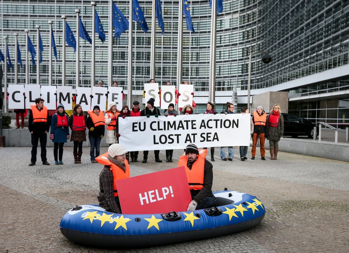 Green activists demonstrate in front of the European commission headquarters in Brussels, Belgium. European Commission released a White Paper outlining its proposal for 2030 EU climate and energy policy on Jan. 22.