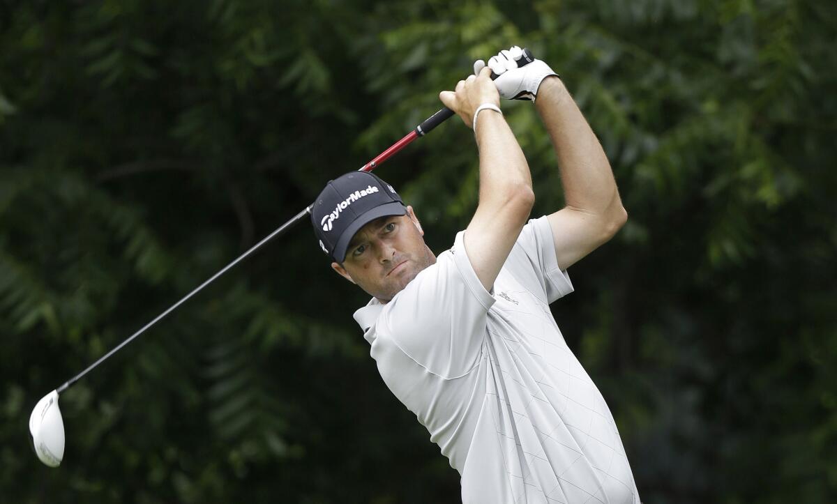 Ryan Palmer watches his tee shot on the sixth hole during the first round of the Colonial golf tournament.