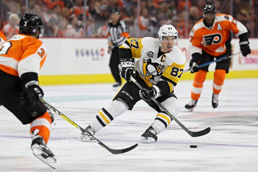 Pittsburgh Penguins center Sidney Crosby (87) guides the puck during a game Saturday against the Philadelphia Flyers.