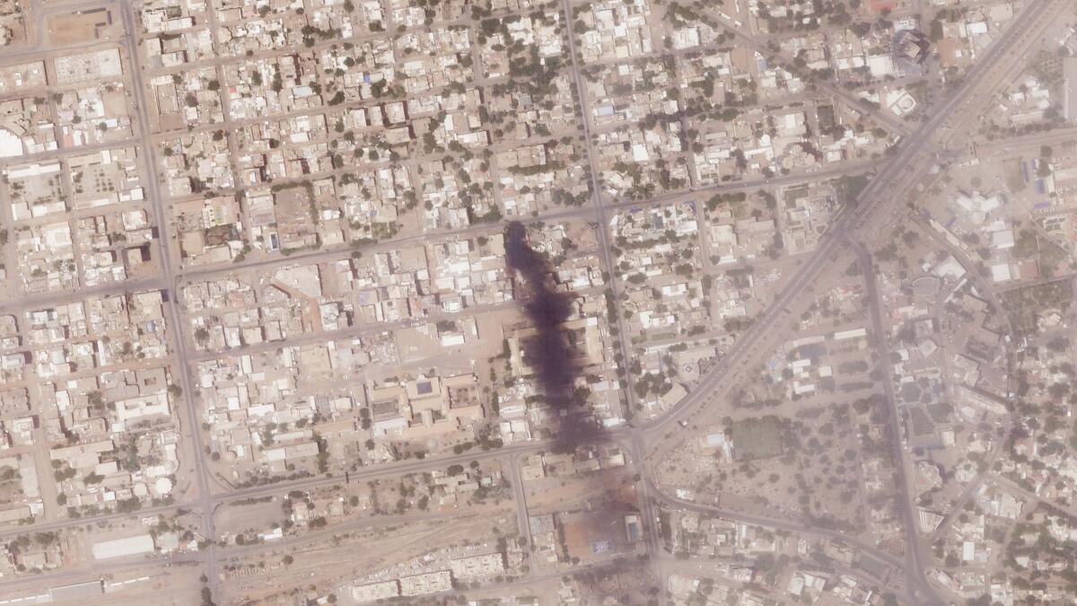 Satellite photo showing black smoke from a fire in Khartoum, Sudan