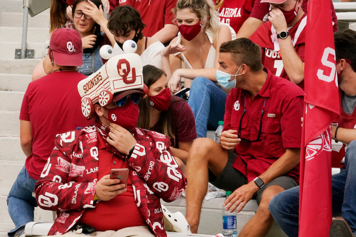 Fans sitting in the Oklahoma student section wait before the start of a game against Missouri State on Sept. 12.
