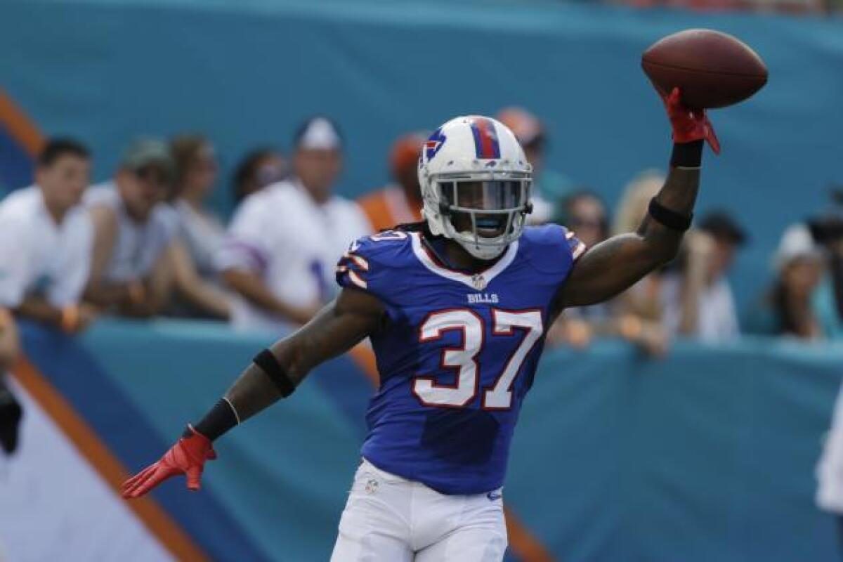 Bills cornerback Nickell Robey celebrates after scoring a touchdown on an interception return against the Miami Dolphins in 2013.
