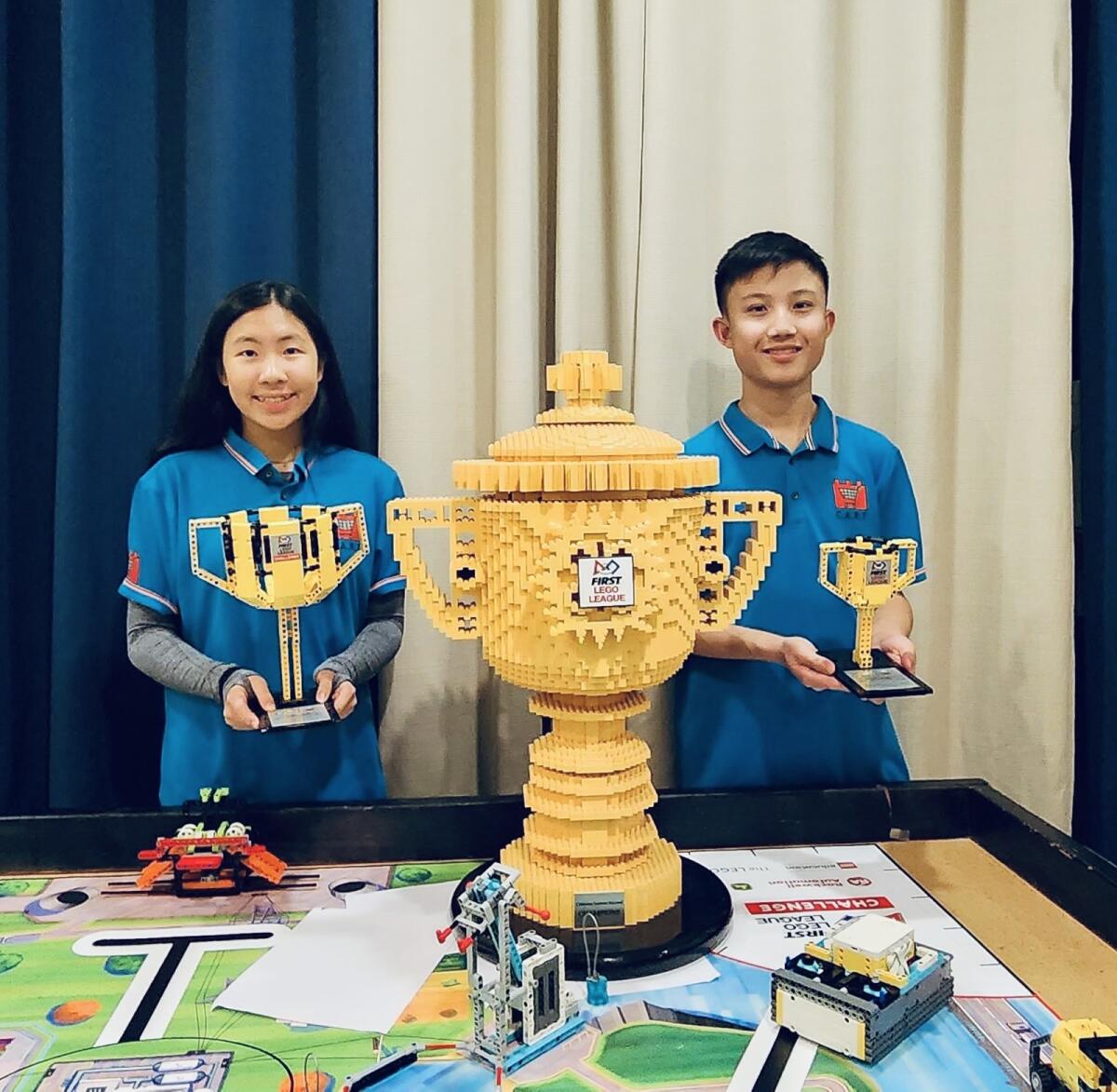 Kayley Xu and Chris Zheng, students at The Bishop's School in La Jolla, are part of a regional champion robotics team. 