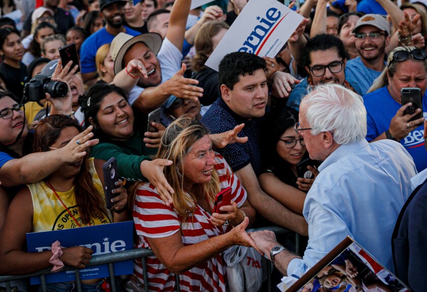 sanders supporters joining hands