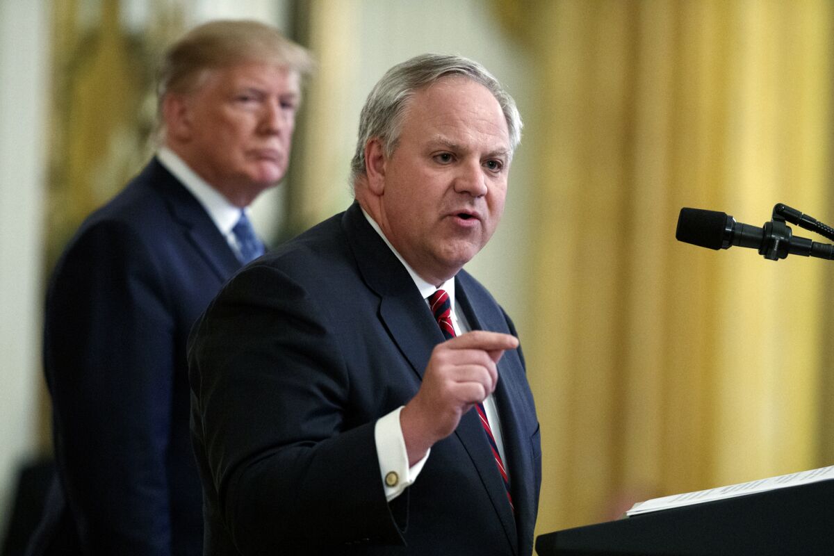 Secretary of the Interior David Bernhardt, pictured July 8, praised Trump Friday for his coronavirus response, after his department downplayed the threat in a memo Wednesday.