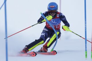 United States' Mikaela Shiffrin speeds down the course during an alpine ski, women's World Cup slalom, in Spindleruv Mlyn, Czech Republic, Sunday, Jan. 29, 2023. (AP Photo/Giovanni Maria Pizzato)