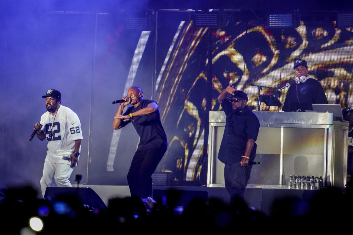 Ice Cube is joined by Dr. Dre, MC Ren and DJ Yella, from left, at Coachella. They dedicated their performance to the late N.W.A founding member "Eazy-E" and to Prince.