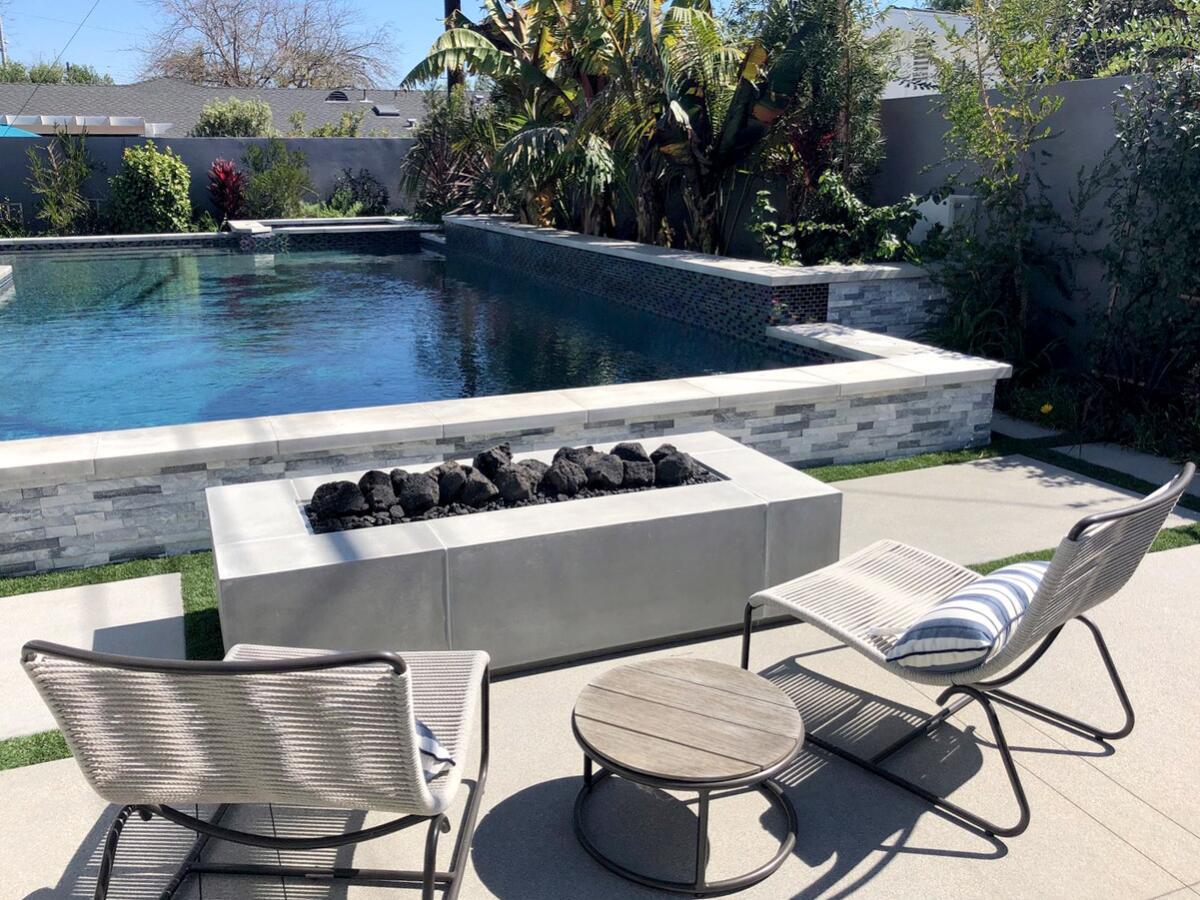 An elevated pool and fire pit on Rossmoor's Spring Garden Tour and Outdoor Marketplace. 