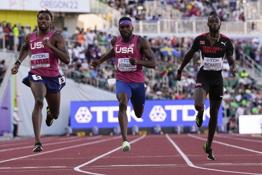 USA's Noah Lyles wins a heat in the men's 200m semifinals at the World Athletics Championships.