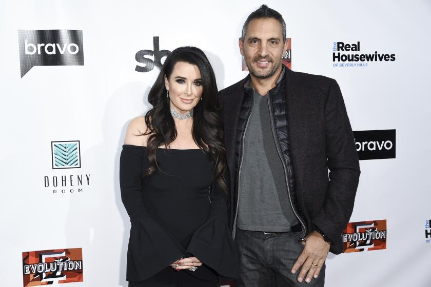Kyle Richards, left, and Mauricio Umansky attend the LA Premiere of "The Real Housewives of Beverly Hills" Season 8 at Doheny Room on Friday, Dec. 15, 2017, in West Hollywood, Calif. (Photo by Richard Shotwell/Invision/AP)