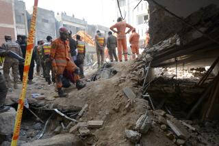 Rescue workers conduct an operation to clear the rubble and search for bodies at the site of Monday's suicide bombing, in Peshawar, Pakistan, Tuesday, Jan. 31, 2023. The death toll from the previous day's suicide bombing at a mosque in northwestern Pakistani rose to more than 85 on Tuesday, officials said. The assault on a Sunni Mosque inside a major police facility was one of the deadliest attacks on Pakistani security forces in recent years. (AP Photo/Muhammad Zubair)