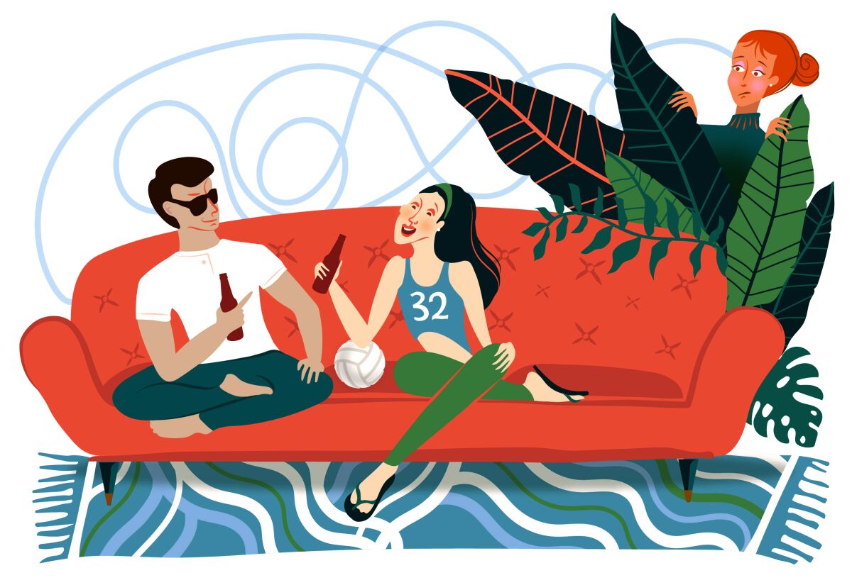 A man sits on a couch chatting up a woman -- while another woman looks on from behind plants.