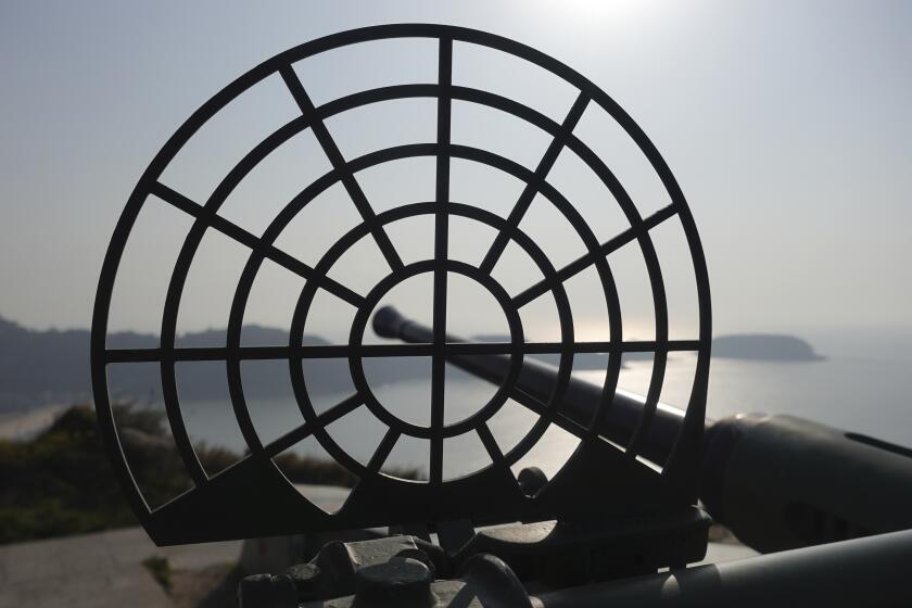 An antiquated 40mm anti-air gun points towards sea at the observation deck on Beigan, part of Matsu Islands, Taiwan on Sunday, March 5, 2023. Just 10km away from mainland China at its closest, Matsu became a fortress and frontline of defense for the Nationalists who had retreated to Taiwan in 1949 after losing to the Communist Party in a civil war. (AP Photo/Johnson Lai)