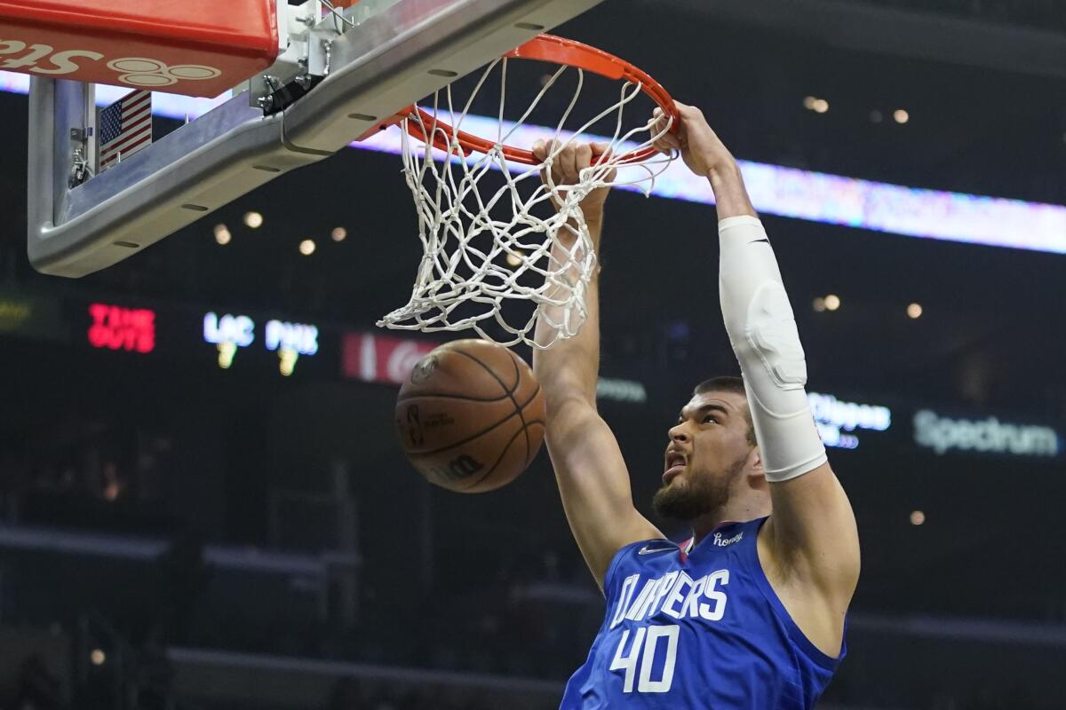 Los Angeles Clippers center Ivica Zubac (40) dunks during the first half.