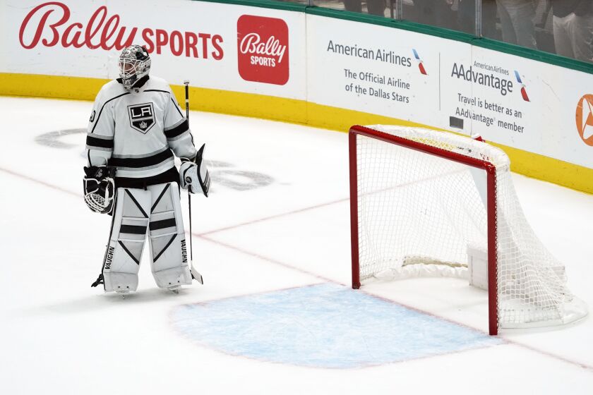 Los Angeles Kings goaltender Cal Petersen looks down ice after giving up three goals to the Dallas Stars during the second period of an NHL hockey game Tuesday, Nov. 1, 2022, in Dallas. (AP Photo/Ray Carlin)