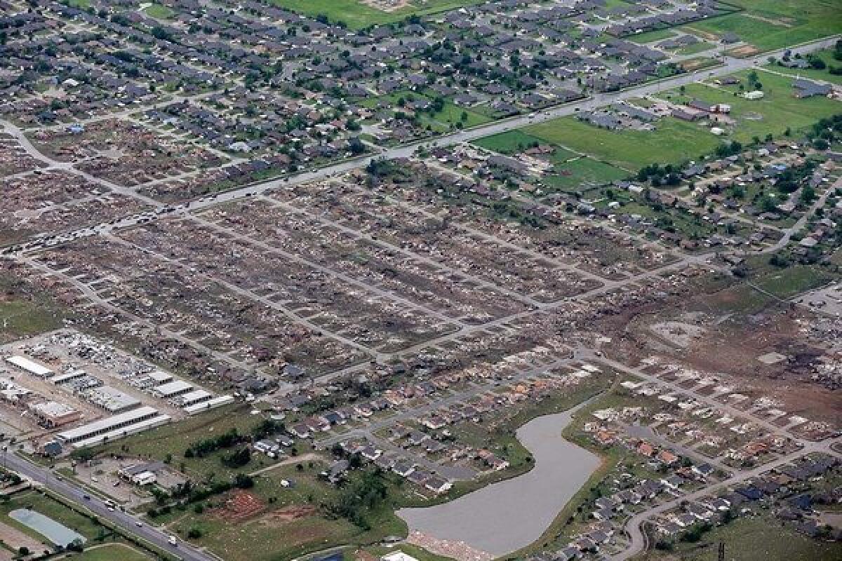 An aerial view shows the tornado's path through a residential area in Moore, Okla.