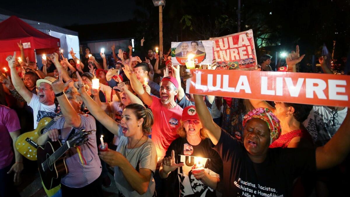 Supporters of Brazilian former president Luiz Inacio Lula da Silva attend a vigil outside the Federal Police Superintendence in Curitiba, Brazil, on Aug. 31.